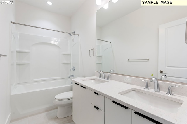 full bathroom featuring tile patterned flooring, vanity, bathing tub / shower combination, and toilet