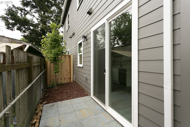 9638 SE Holgate Blvd Unit 1, 2, 3, Portland, OR 97266 - view of property exterior featuring fence and a patio