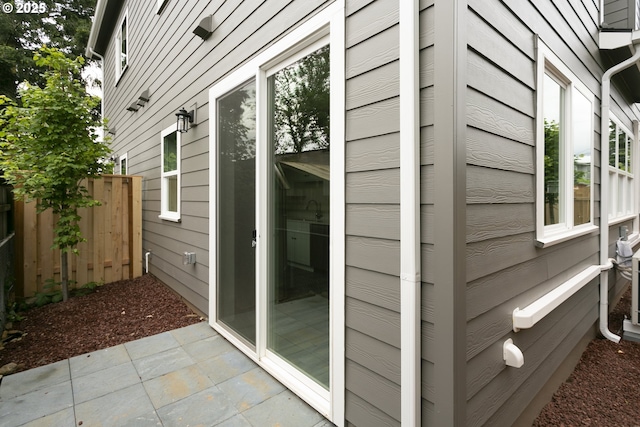 9638 SE Holgate Blvd Unit 1, 2, 3, Portland, OR 97266 - view of side of home with a patio area and fence
