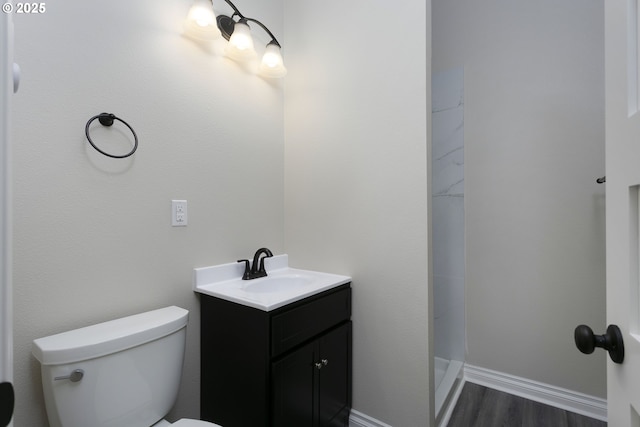 9638 SE Holgate Blvd Unit 1, 2, 3, Portland, OR 97266 - full bathroom with wood finished floors, toilet, vanity, baseboards, and a shower