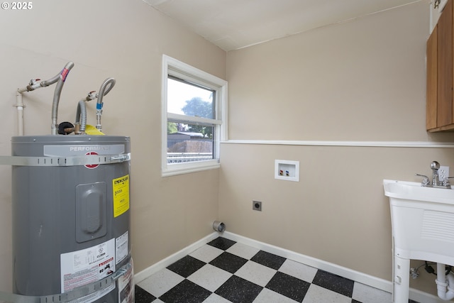 9638 SE Holgate Blvd Unit 1, 2, 3, Portland, OR 97266 - clothes washing area featuring hookup for an electric dryer, secured water heater, washer hookup, laundry area, and tile patterned floors