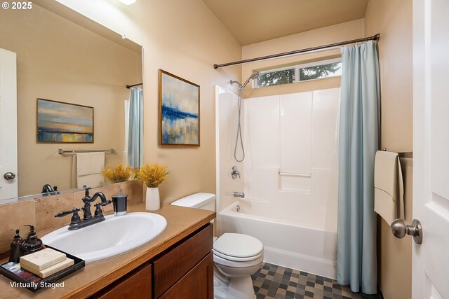 full bathroom featuring shower / bathtub combination with curtain, vanity, and toilet