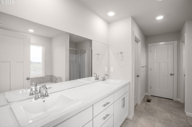 5954 Henshaw St SE, Albany, OR 97322 - bathroom with recessed lighting, double vanity, baseboards, and a shower
