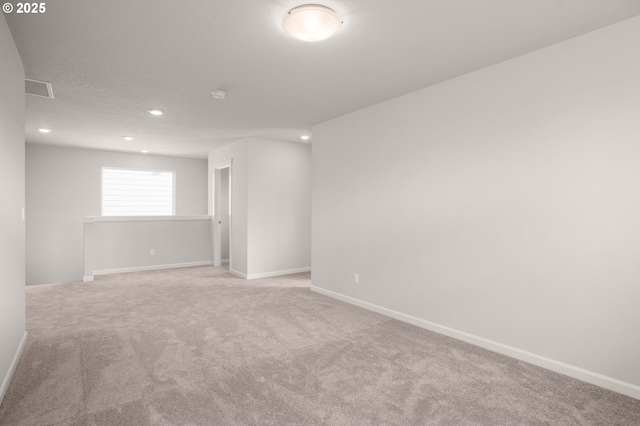 5954 Henshaw St SE, Albany, OR 97322 - spare room with recessed lighting, light colored carpet, and baseboards