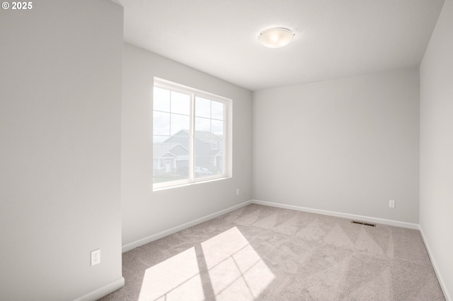 5954 Henshaw St SE, Albany, OR 97322 - empty room featuring light carpet and baseboards