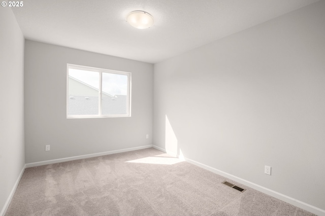 5954 Henshaw St SE, Albany, OR 97322 - carpeted spare room featuring baseboards