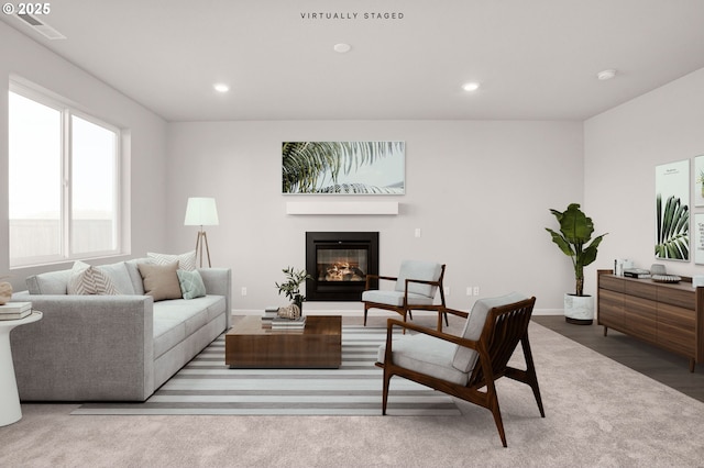 5954 Henshaw St SE, Albany, OR 97322 - living area with a glass covered fireplace, recessed lighting, and baseboards