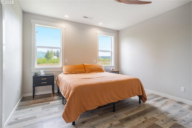 641 E Jones St, Yacolt, WA 98675 - bedroom with multiple windows, recessed lighting, light wood-type flooring, and baseboards