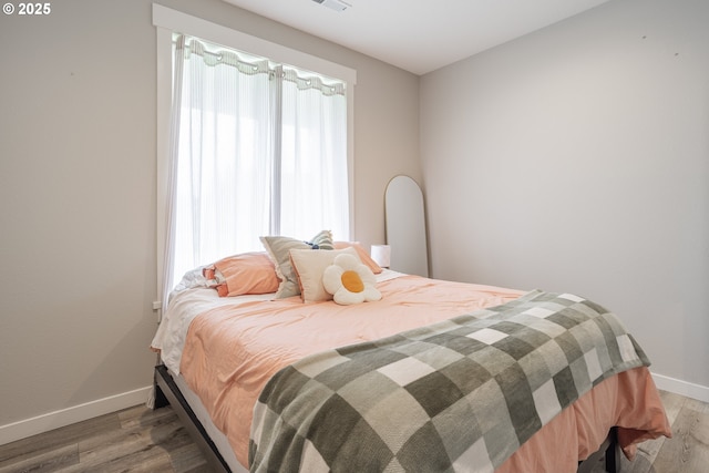 641 E Jones St, Yacolt, WA 98675 - bedroom featuring baseboards and light wood-style floors