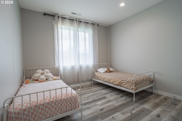 641 E Jones St, Yacolt, WA 98675 - bedroom with wood finished floors and recessed lighting