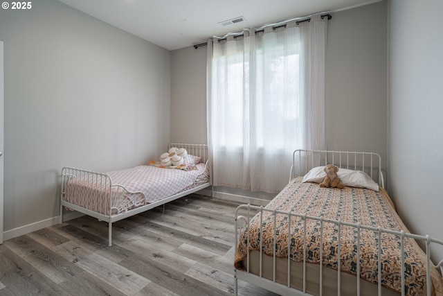 641 E Jones St, Yacolt, WA 98675 - bedroom with wood finished floors and baseboards