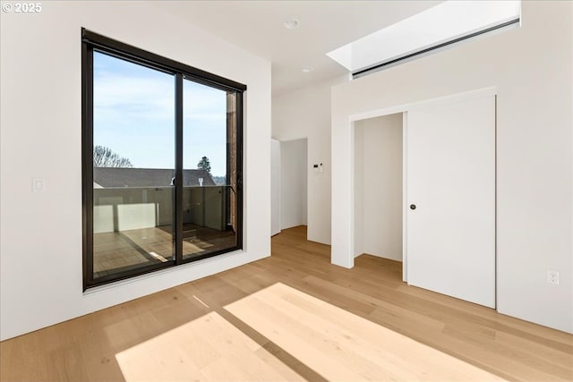 empty room with wood finished floors