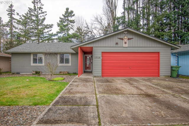 ranch-style house with a garage and a front lawn