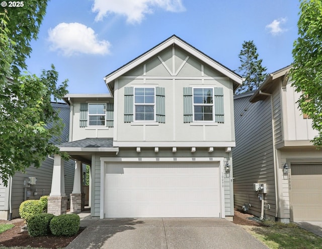 10090 NW Bartlett Loop, North Plains, OR 97133 - view of front facade with a garage and driveway