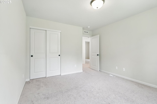 10090 NW Bartlett Loop, North Plains, OR 97133 - unfurnished bedroom with carpet and a closet