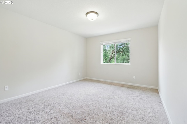 10090 NW Bartlett Loop, North Plains, OR 97133 - spare room with light carpet and baseboards
