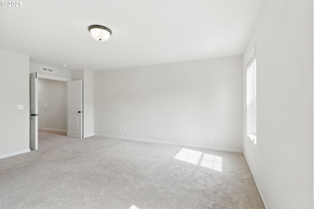 10090 NW Bartlett Loop, North Plains, OR 97133 - unfurnished room with light carpet and baseboards