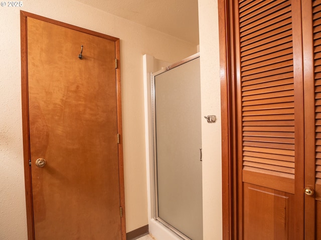 bathroom with an enclosed shower