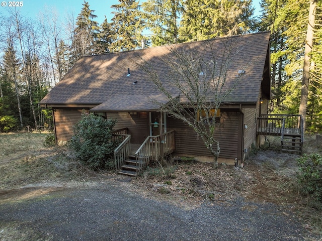 view of front of house featuring a wooden deck