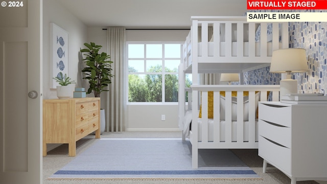 bedroom featuring carpet flooring and baseboards