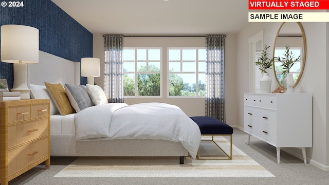 carpeted bedroom featuring baseboards and wallpapered walls