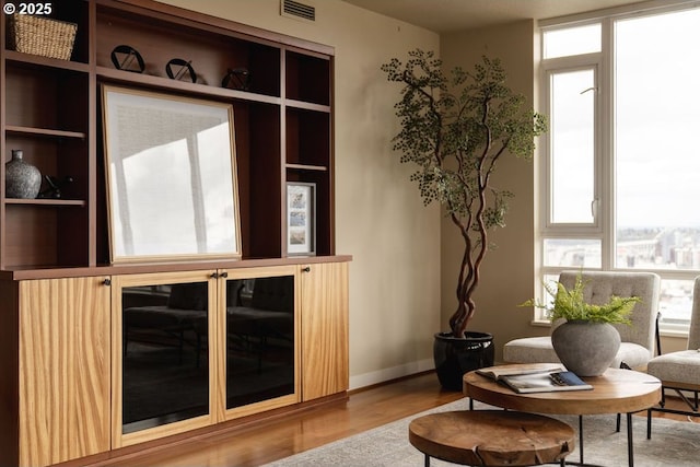 1500 SW 11th Ave Unit 2404, Portland, OR 97201 - sitting room with healthy amount of natural light and wood finished floors