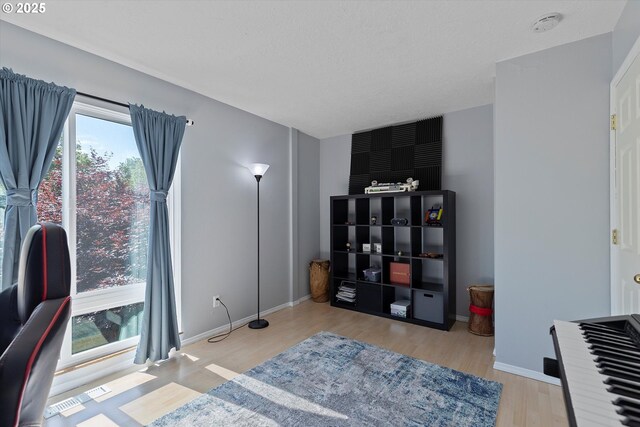 1735 NW Lakeway Ln, Beaverton, OR 97006 - office area featuring wood finished floors and baseboards