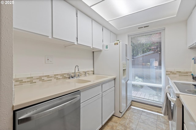 1735 NW Lakeway Ln, Beaverton, OR 97006 - kitchen featuring white appliances, backsplash, white cabinetry, and light countertops