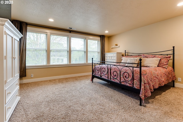bedroom with baseboards and carpet flooring