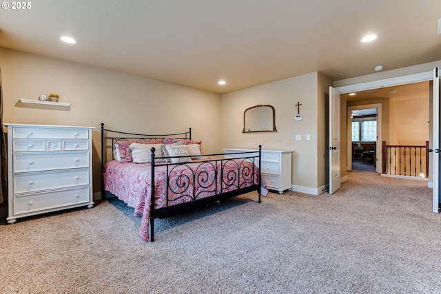 bedroom with carpet floors, recessed lighting, and baseboards