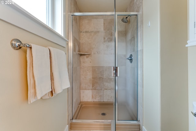full bathroom featuring a stall shower
