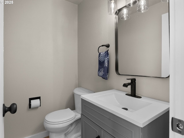 24033 SE Oak St, Gresham, OR 97030 - half bathroom with vanity, toilet, and baseboards