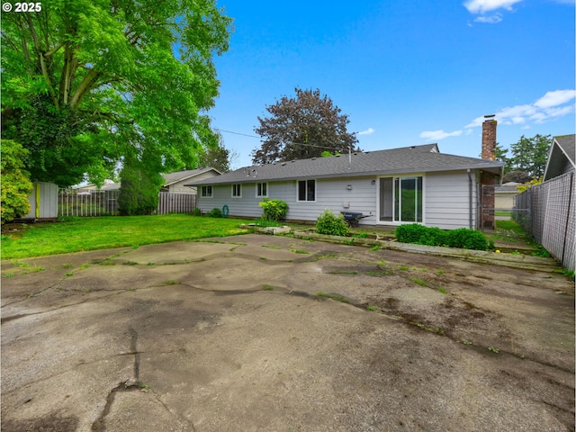 24033 SE Oak St, Gresham, OR 97030 - back of house with a chimney and a patio area