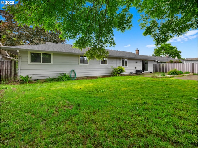 24033 SE Oak St, Gresham, OR 97030 - rear view of property featuring a chimney