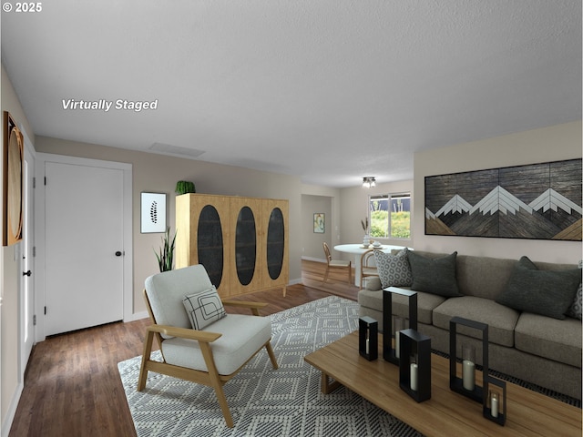 24033 SE Oak St, Gresham, OR 97030 - living area featuring wood finished floors, baseboards, and a textured ceiling