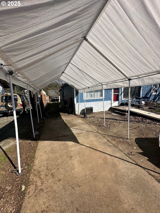 exterior space with a carport