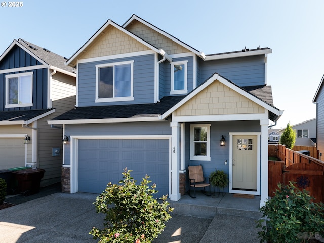 46 Shore Dr, Saint Helens, OR 97051 - view of front of home featuring aphalt driveway, fence, a garage, and a shingled roof