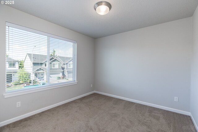 46 Shore Dr, Saint Helens, OR 97051 - carpeted spare room featuring baseboards