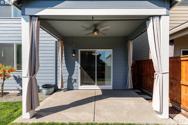 46 Shore Dr, Saint Helens, OR 97051 - view of exterior entry featuring a patio area, fence, and a ceiling fan
