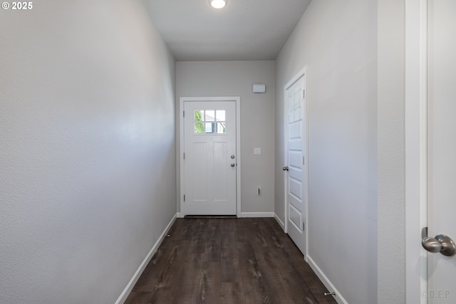 46 Shore Dr, Saint Helens, OR 97051 - doorway to outside featuring baseboards and dark wood finished floors