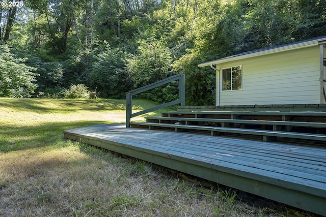 594 NE Newport Heights Dr, Newport, OR 97365 - wooden terrace with a lawn and a view of trees