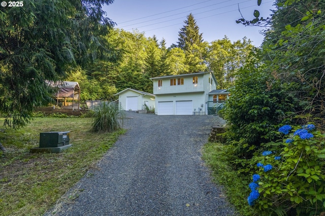594 NE Newport Heights Dr, Newport, OR 97365 - view of front facade with driveway