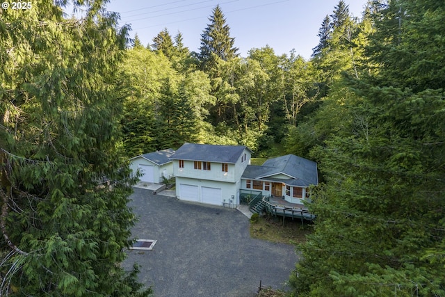 594 NE Newport Heights Dr, Newport, OR 97365 - birds eye view of property with a forest view