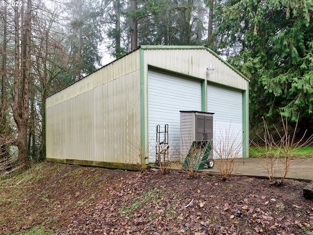 view of outbuilding with a garage