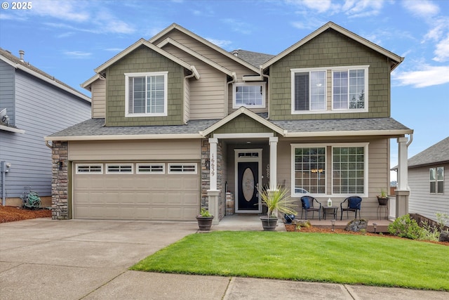 craftsman house with concrete driveway, a garage, stone siding, and a shingled roof