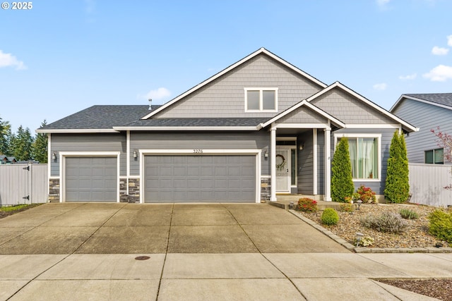 3276 S Mountain View Dr, Albany, OR 97322 - craftsman inspired home featuring concrete driveway, an attached garage, and stone siding
