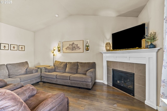 3276 S Mountain View Dr, Albany, OR 97322 - living room featuring vaulted ceiling, wood finished floors, and a tiled fireplace