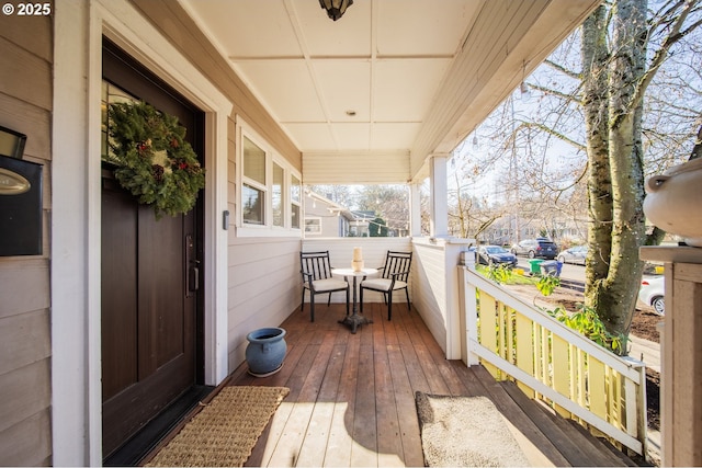 balcony featuring covered porch