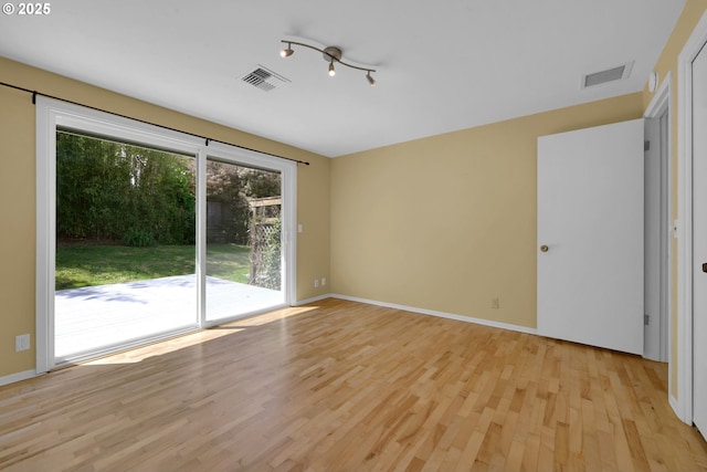 2720 Taylor St, Eugene, OR 97405 - empty room featuring baseboards, light wood-type flooring, and visible vents
