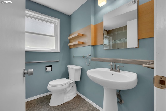 2720 Taylor St, Eugene, OR 97405 - bathroom with a sink, toilet, speckled floor, baseboards, and visible vents